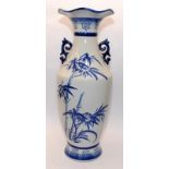 Large Oriental blue and white hand painted baluster vase. 60cms tall