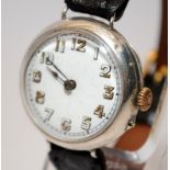 WW1 era sterling silver cased mechanical trench watch on leather strap. Good cosmetic condition