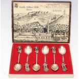 Set of six .800 silver spoons by German maker WMF with rose finials. In original WMF branded box
