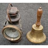 Powell & Hammer vintage railway lantern together with a wooden handled brass school bell (2).