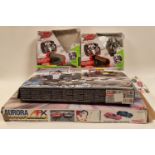 Two Air Hogs boxed r/c cars together with two racing sets. Boxes not checked for completeness.