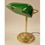 Contemporary brass "bankers" lamp with green glass shade.