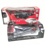 A radio controlled Aston Martin Car and a BMW Z4.