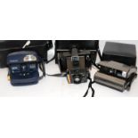 A small collection of vintage Polaroid instant cameras to include Super Swinger, Polaroid 600 and an