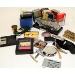 A quantity of compacts, small penknives and other collectibles
