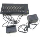 A ZX Spectrum + Keyboard and wires.