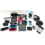Collection of Electronics ranging from Cameras, Handheld Consoles to Speakers.