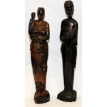 Pair of large hand carved African figures depicting women with babies. Largest 65cms