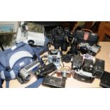 A collection of vintage photographic equipment to include Pentax MV 35mm SLR. Carl Zeiss lens, slide