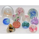 Collection of paperweights to include Caithness examples. 11 in lot