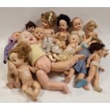 Large collection of vintage toy dolls in various conditions.