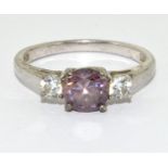 A 925 silver trilogy ring with pink and white stones. Size T