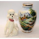 Large baluster vase featuring a European mountain scene c/w a kitsch pottery poodle. Vase is 32cms