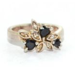 A 925 silver flower/leaf ring Size L