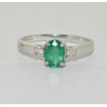9ct white gold ladies Emerald and Diamond trilogy ring size N