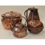 4 items of beaten copper to include a T-Pot and a water jug