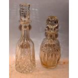 Two crystal glass decanters, the larger 34cms decanter being Waterford Crystal in the Lismore