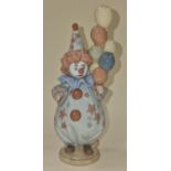 Lladro figurine of a clown holding balloons 19cm tall.