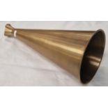 A brass megaphone (105)