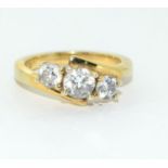 A gold on 925 silver and CZ trilogy ring Size K