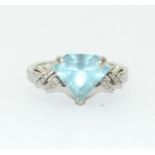 A 925 silver and blue topaz ring Size P 1/2.