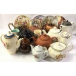 Four Wedgwood fairy plates together with a collection of tea pots and other misc chinaware.