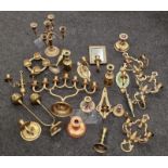 Large collection of vintage and contemporary brass/metalware candle holders.