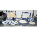 Quantity of vintage possibly Victorian flow blue china dinner ware to include tureens and serving