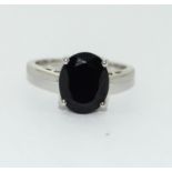 A 925 silver and black stone ring Size N