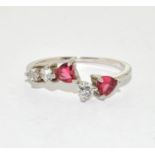 A 925 silver and rubalite and cz heart ring Size P 1/2.