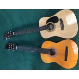 2 full size acoustic guitars by Encore and Chantree.