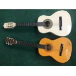 2 half size acoustic guitars by Eastcoast and Sevilla. Both being 6 stringed.