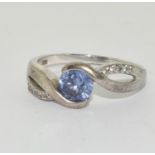 A 925 silver and CZ, tanzanite ring Size T