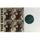 THE SMITHS, RARE COLLECTORS 10" VINYL ‘MEAT IS MURDER”. An Ex condition vinyl copy here on WEA