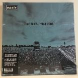 OASIS SEALED BOXSET ‘TIME FLIES….1994 - 2009’. This is the complete Oasis singles collection pressed