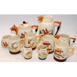 Vintage Keele Street Pottery tea set including teapot featuring hinting scenes. 10 pieces in lot