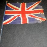 Vintage distressed Union Flag on a wooden staff. 110cms x 83cms