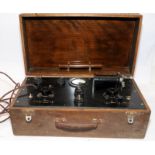 Vintage electronic device in wooden case. Possible military application. Could be a Morse