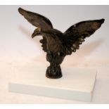 Vintage cast metal eagle mounted on a marble base. 12cms tall