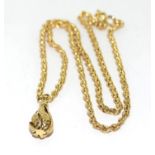 9ct gold rope chain necklace with an open work pendant 4g