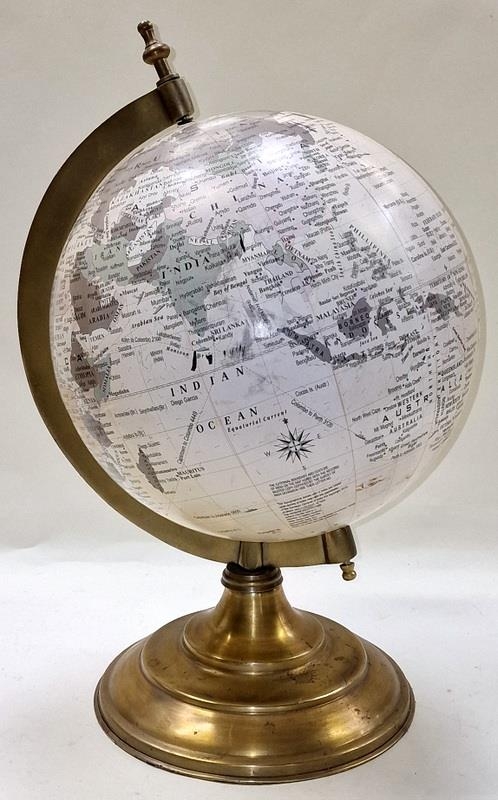 Rotating globe of the world on stepped brass stand 12 inch diameter.