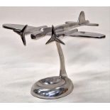Contemporary chrome ash tray in the form of a vintage air plane 22cm tall.