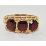 9ct Gold Ladies Garnet Oval Cut Ornate Trilogy Gypsy Ring. Size R