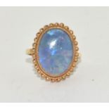 A 9ct gold opal ring Size L , 3grams.