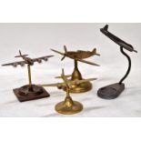 Collection of stylish ornaments of vintage aircraft. Two cast in pewter and the other two in
