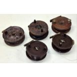 Collection of five vintage centre pin fishing reels including Alcocks bakelite examples.