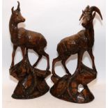 Pair of large Black Forest carved deer. One signed SC Hallbusche 1887. Both around 60cms tall.