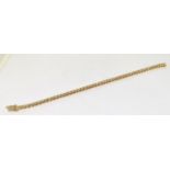 Diamond, over 1.00ct 18ct (11.5g) gold tennis bracelet, 7".