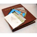 Royal Mail Presentation album containing first day covers, coin covers and stamp booklets. Lot