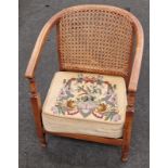Vintage mahogany cane back bedroom chair with tapestry seat.